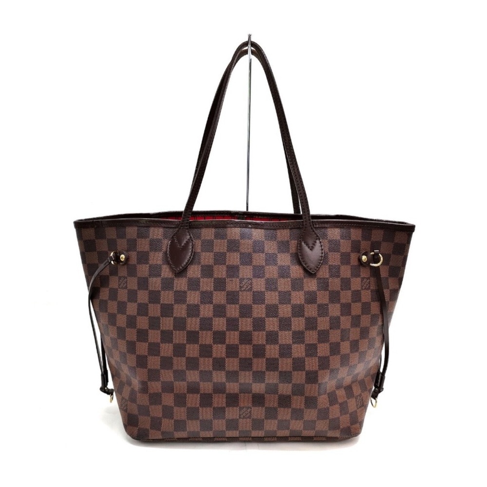 Louis Vuitton never full MM excellent condition no call outs